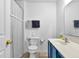 Bathroom featuring a toilet, sink with vanity, and shower with a curtain at 12258 Weathered Edge Dr, Fishers, IN 46037