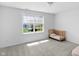 Bright bedroom with a large window and light colored walls over carpet floors at 12258 Weathered Edge Dr, Fishers, IN 46037