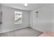 Bedroom featuring a large window and light-colored walls over carpet floors at 12258 Weathered Edge Dr, Fishers, IN 46037