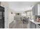 A kitchen featuring an open layout concept with black chairs and stainless steel appliances at 12258 Weathered Edge Dr, Fishers, IN 46037