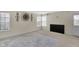 Open living room area with large windows providing ample natural light at 12258 Weathered Edge Dr, Fishers, IN 46037