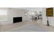 Bright and airy living room with kitchen access, neutral tones, and laminate flooring at 12258 Weathered Edge Dr, Fishers, IN 46037