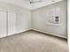 Simple bedroom with carpet, a window, and closet with sliding doors at 12521 Hawks Landing Dr, Fishers, IN 46037