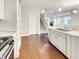 Open kitchen with stainless appliances and eat-in bar at 12521 Hawks Landing Dr, Fishers, IN 46037