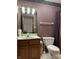 Bathroom with vanity, toilet, and shower at 1304 Park Meadow Dr, Beech Grove, IN 46107