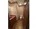 Retro powder room features a vanity with a red sink at 1304 Park Meadow Dr, Beech Grove, IN 46107