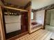Vintage bathroom boasts a bathtub with tile accents and glass enclosed shower at 1304 Park Meadow Dr, Beech Grove, IN 46107