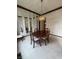 Formal dining room with wood table, chandelier, and mirrored walls at 1304 Park Meadow Dr, Beech Grove, IN 46107
