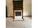 Carpeted living room with a fireplace with white tile surround at 1304 Park Meadow Dr, Beech Grove, IN 46107