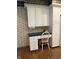 Kitchen with white cabinets, desk and a refrigerator at 1304 Park Meadow Dr, Beech Grove, IN 46107