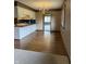 Bright and airy kitchen with white cabinets and stylish decor at 1304 Park Meadow Dr, Beech Grove, IN 46107