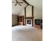 Living room featuring fireplace, built-in shelving and vaulted ceilings at 1304 Park Meadow Dr, Beech Grove, IN 46107