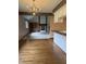 Inviting living room with a fireplace, built-in shelving and vintage decorative touches at 1304 Park Meadow Dr, Beech Grove, IN 46107