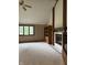 Living room featuring fireplace, built-in shelving and vaulted ceilings at 1304 Park Meadow Dr, Beech Grove, IN 46107