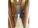Cozy powder room featuring a toilet, and tile flooring at 1304 Park Meadow Dr, Beech Grove, IN 46107