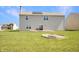 This property features a well-maintained backyard, complete with a fire pit at 1416 Gleneagle Dr, Indianapolis, IN 46239