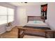 This cozy bedroom offers a window view and a decorative bed at 1416 Gleneagle Dr, Indianapolis, IN 46239