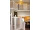 Hallway leading to a naturally lit living room with a fireplace at 1416 Gleneagle Dr, Indianapolis, IN 46239
