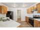 Updated kitchen featuring stainless steel appliances, wood cabinetry, and white countertops at 14226 Marilyn Rd, Noblesville, IN 46060