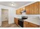 Kitchen with stainless steel range, wood cabinets, and plenty of counter space at 14226 Marilyn Rd, Noblesville, IN 46060