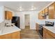 Well-equipped kitchen with stainless steel appliances, wood cabinetry, and white countertops at 14226 Marilyn Rd, Noblesville, IN 46060