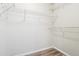 Spacious walk-in closet with white walls and wire shelving for organized storage solutions at 14226 Marilyn Rd, Noblesville, IN 46060