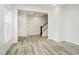 Foyer with lots of natural light, wood-look flooring, and stairway to the second floor at 14538 Hanford Ln, Carmel, IN 46074