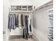 This walk-in closet offers ample storage, including shelving and hanging space, to efficiently organize your wardrobe at 1501 Chanson Ln, Westfield, IN 46074