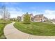 Charming single-Gathering home boasts a brick exterior, manicured lawn, and an attached garage at 1501 Chanson Ln, Westfield, IN 46074