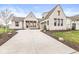 Charming single-Gathering home boasts a brick exterior, manicured lawn, and an attached garage at 1501 Chanson Ln, Westfield, IN 46074