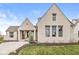 Charming single-Gathering home boasts a brick exterior, manicured lawn, and an attached garage at 1501 Chanson Ln, Westfield, IN 46074
