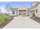 Charming single-Gathering home boasts a brick exterior, manicured lawn, and an attached garage at 1501 Chanson Ln, Westfield, IN 46074