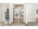Open floor plan with vaulted ceilings and wood beams showcasing the living, dining, and kitchen areas at 1501 Chanson Ln, Westfield, IN 46074