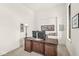 Bright office features a large wood desk and decor with a decorative letter B at 1501 Chanson Ln, Westfield, IN 46074