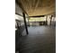 Spacious wooden back porch is perfect for entertaining and relaxing outdoors at 1623 S Grant Ave, Indianapolis, IN 46203