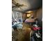 Bedroom features paneled ceiling, tile floors, and a large TV at 1623 S Grant Ave, Indianapolis, IN 46203
