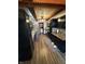 Well-lit kitchen with black cabinetry, neutral countertops, and hardwood-style flooring at 1623 S Grant Ave, Indianapolis, IN 46203