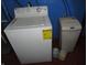 Basement laundry area, featuring white washer and dryer units at 1722 N Parker Ave, Indianapolis, IN 46218