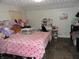 Bright Hello Kitty themed bedroom with accessories and tiled flooring at 1722 N Parker Ave, Indianapolis, IN 46218