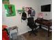 This bedroom has wood laminate floors with lots of posters on the walls at 1722 N Parker Ave, Indianapolis, IN 46218