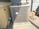 Home's AC unit surrounded by exterior items at 1722 N Parker Ave, Indianapolis, IN 46218