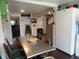 Spacious kitchen with stainless steel appliances, white cabinetry, and hard wood floors at 1722 N Parker Ave, Indianapolis, IN 46218