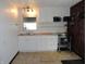 This kitchen has modern cabinets, a window for natural light and an eat in area at 1722 N Parker Ave, Indianapolis, IN 46218