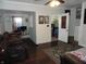 Inviting living room with hard floors, leather sofa and neutral paint at 1722 N Parker Ave, Indianapolis, IN 46218