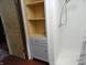Shower includes mounted storage unit, perfect for organizing toiletries and keeping bathroom essentials handy at 1722 N Parker Ave, Indianapolis, IN 46218