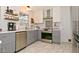 Updated kitchen with stainless steel appliances, gray lower cabinets, and white upper cabinets at 1741 Terrace Ct, Franklin, IN 46131