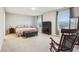 Spacious main bedroom featuring neutral tones, plush carpet, and ample natural light at 1862 Downey Ln, Greenfield, IN 46140