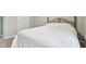 Inviting bedroom with neutral tones, a comfy bed, and access to a door at 1862 Downey Ln, Greenfield, IN 46140