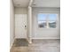 Bright entryway featuring wood-look floors, a neutral color palette, and a window for natural light at 1862 Downey Ln, Greenfield, IN 46140