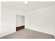 Clean, carpeted room with neutral walls, bright lighting and white trim at 19113 River Jordan Pass, Westfield, IN 46074